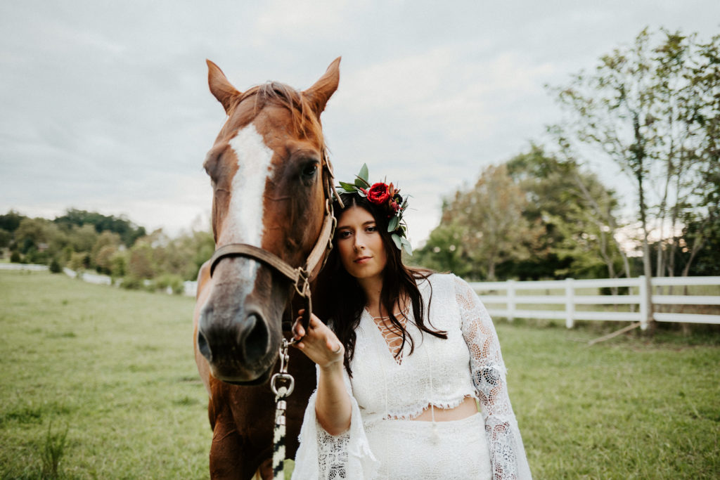 boho raleigh elopement with horses bridal portrait
